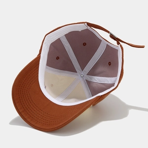 Brown baseball cap with contrast letter embroidery featuring internal structure and metal buckle
