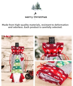 Detail of knitted forest gnome wine bottle cover with Christmas tree and white beard