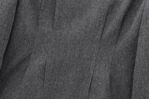 Detailaufnahme der dunkelgrauen Strick-Wollmischung mit feiner Textur für Damen-Blazer