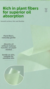 Macro shot of mint green plant fiber oil absorbing sheets with fine smooth texture