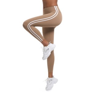 Vue latérale détaillée du legging de yoga kaki taille haute avec doubles rayures blanches