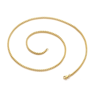 3mm golden box chain necklace with lobster clasp in a spiral arrangement on white background