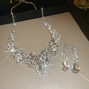 Sparkling waterdrop jewelry set with rhinestones on necklace and earrings, silver finish