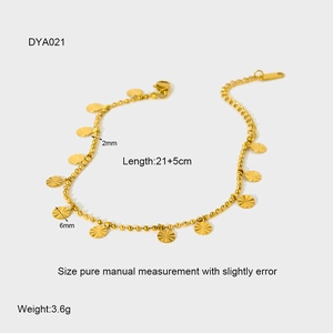 Macro shot of 18K gold plated beaded chain with sunburst charm details and dimensions