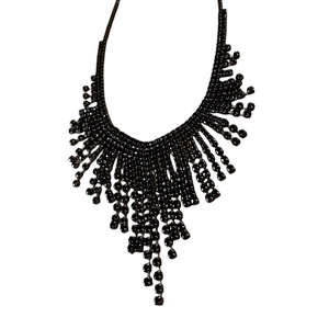 Elegant black rhinestone fringe necklace with bohemian tassel strands in a vintage style