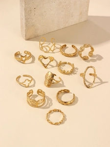 Set of 11 vintage 18k gold plated rings with moon, star and crown relief patterns