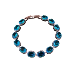Elegant silver bracelet featuring thirteen oval-cut aquamarine gemstones with buckle