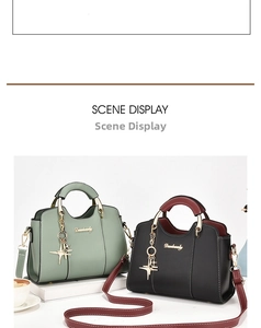 Detail of mint green and black leather handbags with star pendants and golden hardware