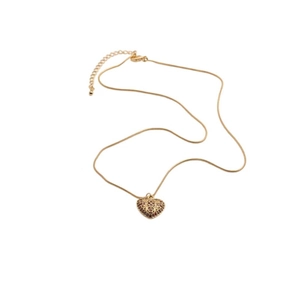 Golden snake chain necklace featuring a hollow heart-shaped pendant on a white background