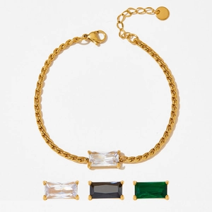 Gold stainless steel bracelet with three interchangeable rectangular zircon stones in white, black, and green