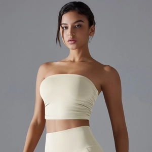 Detailed close-up showing the pleated side texture of this slim fit sports bra top