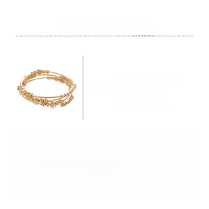 Macro detail of multi-layer geometric iron bracelet featuring rhinestone accents and dimensions
