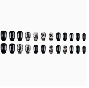 Flat lay of 24pcs black and white rose pattern press-on nails in trapezoid shape