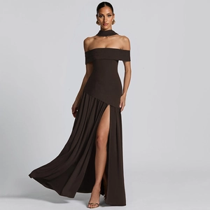 Detail of elegant brown off-shoulder dress with high side slit and neck scarf accessory