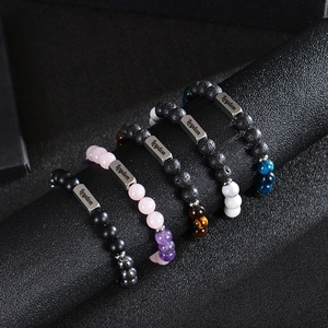 Custom stainless steel name bracelets with natural lava, tiger eye, and crystal beads
