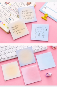 Close-up of pastel gradient sticky notes used in a creative planner journaling set