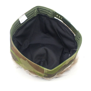 Detail view of camouflage baseball cap interior with mesh lining and adjustable strap
