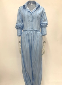 Detail of blue and white striped long sleeve cropped shirt with matching elastic waist pants