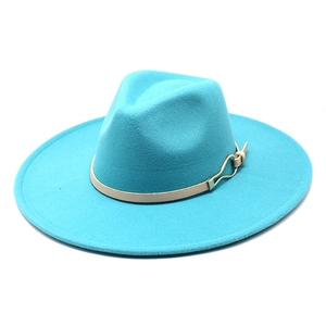 Detailed top view of wide brim wool fedora hat in teal blue with beige decorative band