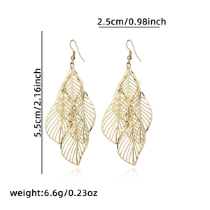Detailed view of gold leaf earrings with hollow design and size dimensions shown