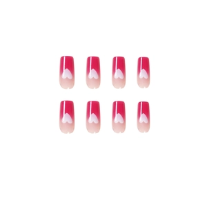 Pink ombre press-on nails with white heart design, glossy finish, square shaped set