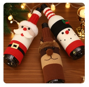 Detailed trio of Santa, snowman, and reindeer knitted Christmas wine bottle covers