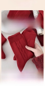 Close-up of soft ribbed red cotton socks showing stretchy fabric and premium texture