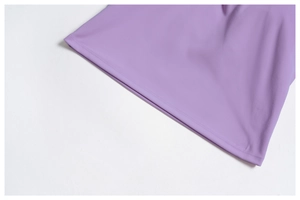 Detailed close-up showing the double-needle stitching on lavender purple yoga vest hem
