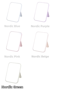 Detail view of foldable makeup mirrors in various Nordic pastel colors with adjustable stand