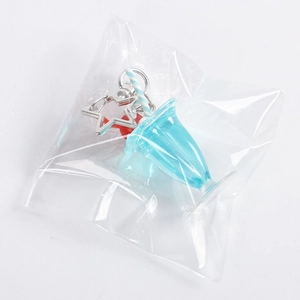 Creative miniature milkshake keychain with blue liquid and star-shaped metal ring