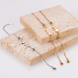 Three heart charms stainless steel bracelets in gold silver and rose gold finishes