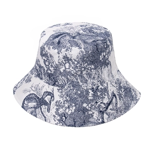 French Toile de Jouy jungle print bucket hat with wide brim for outdoor sun protection