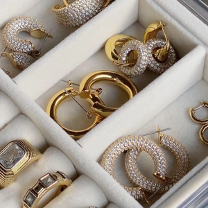 Selection of 18k gold plated stainless steel earrings and rings with cubic zirconia