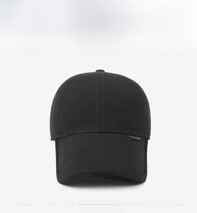 Detailed front view of black baseball cap with premium waffle knit texture and curved brim