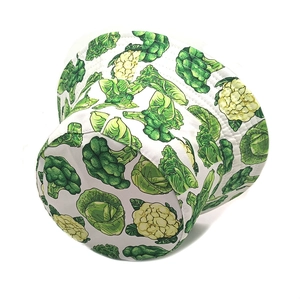 Detail of white bucket hat with green broccoli pattern and premium twill fabric texture