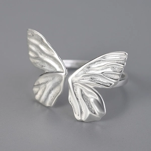 Elegant S925 sterling silver butterfly open ring with textured wings and adjustable band