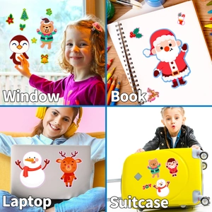 Christmas stickers applied on window, laptop, and suitcase for festive DIY decoration