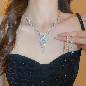Elegant silver tassel jewelry set with sparkling rhinestones for wedding and evening events