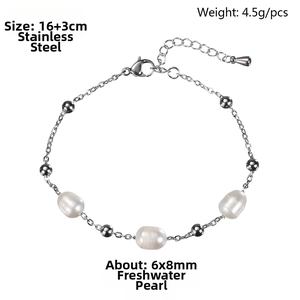 Detail of 18K gold-plated stainless steel bracelet with freshwater pearls and beads