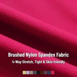 Close-up of four-way stretch brushed fabric for athletic yoga bra in deep rose red color
