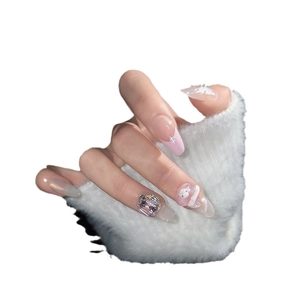 Faux ongles faits main dégradé rose avec figurine cartoon et zircon violet étincelant