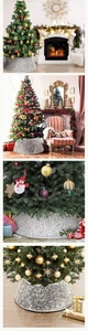 Modern living room setup with a silver sequin Christmas tree skirt around the base