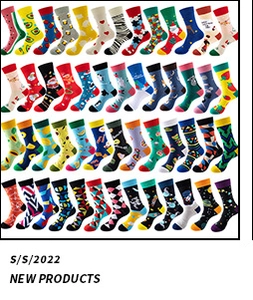 Flat lay of multiple colorful patterned low cut liner socks in vibrant designs