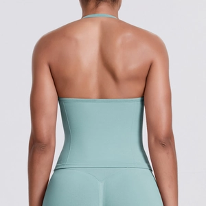 Detail view of mint green high-elastic halter back sports top with flat seams
