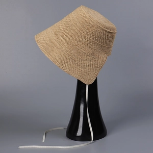 Elegant Raffia straw bucket hat in khaki with white adjustable windproof chin strap
