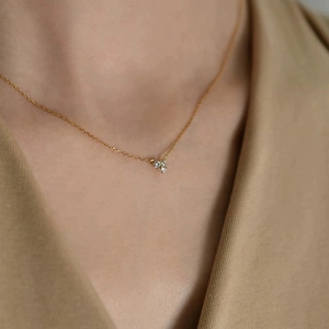 Exquisite 18K gold-plated 925 silver necklace with three-zircon cluster pendant on model