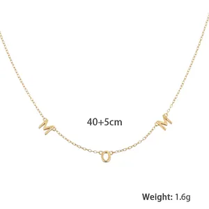Detailed macro view of S925 sterling silver MOM pendant on a fine cross chain
