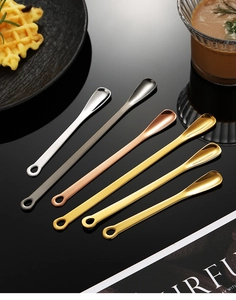 Detailed view of 304 stainless steel coffee spoons with hanging holes in multiple colors