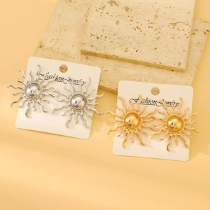 Exaggerated vintage sunburst stud earrings in gold and silver finish for women