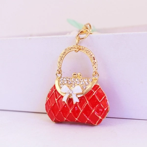 Rhinestone red handbag keychain with gold chain and bow detail for women bags